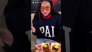 Dua Lipa food reviewing spicy chicken on Instagram stories