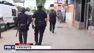 Cops rush to a scene and immediately try to cuff the store owners