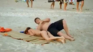 The girl fell asleep on the beach. Prank. Quite funny