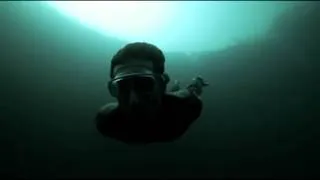 Guillaume Nery base jumping at Dean's Blue Hole - Schiller Moya [Falling]