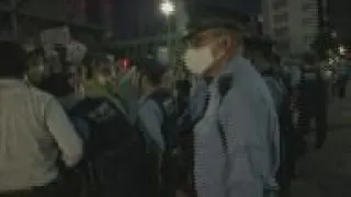 Anti-Olympics protesters scuffle with police in Tokyo