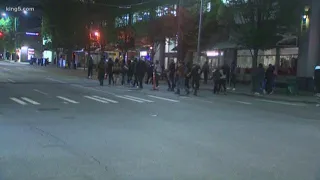 Police move protesters out of downtown Seattle late Sunday night