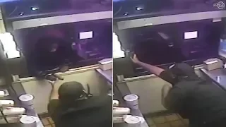 Burger King worker fights off robber in drive thru window