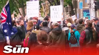 Thousands protest Covid bill outside Melbourne's Parliament