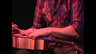 James Hill Playing The 'Ukulele With Chopsticks And A Comb