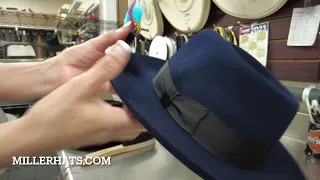 How to put a feather on a fedora hat. #fedora #hats #hatshop #mensfashion