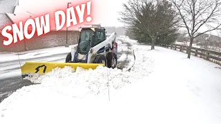 Snow days are the best! Bobcat S750 plowing snow