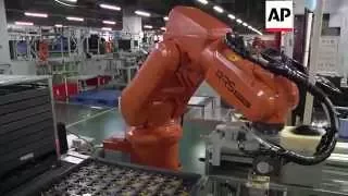 Chinese factory workers being replaced by robots - 2015