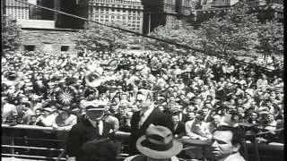 People gather to greet cadets on board a Norwegian sailing ship as it reaches a h...HD Stock Footage