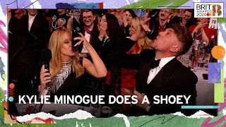 Kylie Minogue Shows Roman An Aussie Tradition | The BRIT Awards 2024