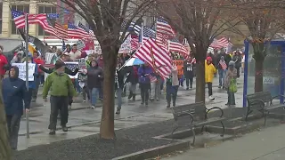 Hundreds march in protest of Erie County's mask mandate