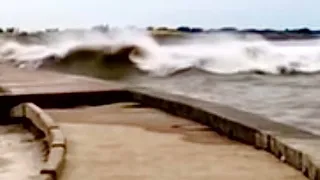 Tanker ship creates huge wave through water displacement