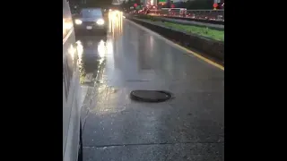 The powerful wind has this heavy ass manhole cover looking like a little Oreo  (@mp154) #shorts