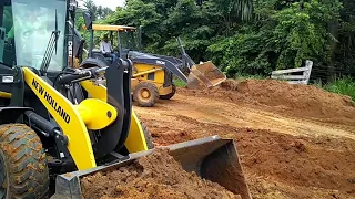 Carregadeira e Retroescavadeira trabalhando