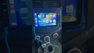 My iPhone 14 connected to my new double din car radio
