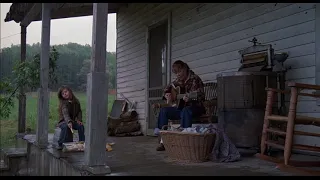 Her kids running around her, Loretta learns guitar -- Sissy Spacek in Coal Miner's Daughter