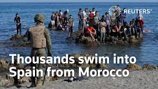 Thousands of migrants reach Spain from Morocco