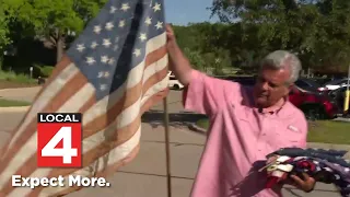 Hundreds of Metro Detroit residents drop off worn flags to be respectfully retired