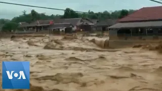 26 Dead, Thousands Caught in Flooding in Indonesia's Capital