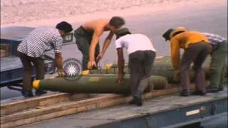 U.S. soldiers and Thai workers load bombs on a flatbed truck at U-Tapao Airfield ...HD Stock Footage