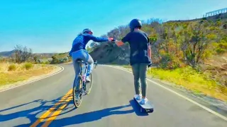 Longskateboarders~vs~Cyclist-'_-Who's~Faster?? New record!