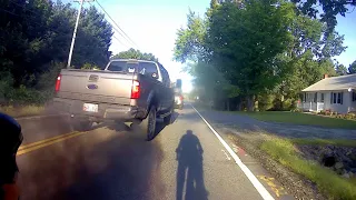 Pickup Truck Rolling Coal on Cyclist