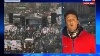 ▶ EuroMaidan Protester in Kiev hands a Russian State TV Reporter an  Oscar  during a live broadcast