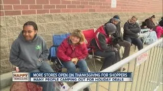 Shoppers wait in line for Black Friday deals on Thanksgiving