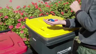 Yellow recycling bin