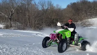 Honda TRX 450r snow ridding WITH PADDLE TIRES (Hillclimbs Don't Work)