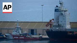 Humanitarian aid is loaded onto cargo ship in Cyprus for shipment to Gaza