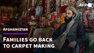 Afghan families go back to making carpets as economy unravels | AFP