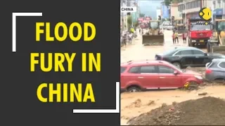 China floods wreak havoc forcing evacuation