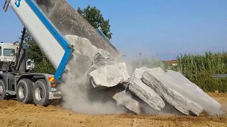 Truck Unloading big Rocks