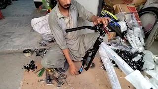 mountain bike assemble [a young man assembled a mountain bike]