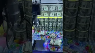 WINNING CASH FROM THE CLAW MACHINE