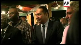 "Baby Doc" Duvalier in hotel, supporters around him