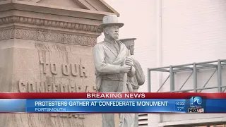 Portsmouth Confederate monument covered with sheets and bags, protesters call for removal of the sta