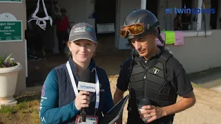 Rosie Napravnik speaks with jockey John Velazquez backside at Churchill Downs