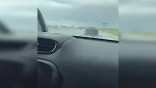 RAW: Mother navigates hail, spinouts on Highway 99 with daughter in car