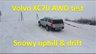 Volvo XC70 cross country offroad, AWD test on snowy hill and drift. Volvo on snow.