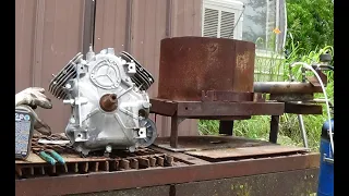 Melting a junk lawnmower motor with a waste Oil Burner