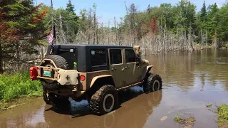 Jeeps attempt water crossing