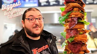 Eating the TALLEST BURGER IN CANADA - Can I beat @JoelHansen? CN TOWER BURGER @burgerfactorycanada