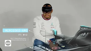 Lewis Hamilton trying out augmented reality software by TeamViewer