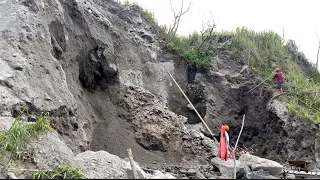 The sand cliff they were mining had a huge landside