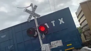 Northbound Norfolk Southern auto box car train at stassney lane in Austin Texas plus rear DPU