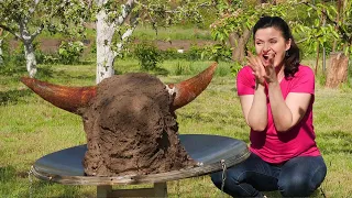 Cooking in the village. An incredible sight: a bull's head in a tandoor. 4K