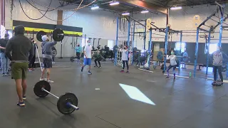 Gym's workout fundraiser honors Officer Darian Jarrott