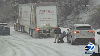 Dozens of vehicles get stuck in snow near Running Springs